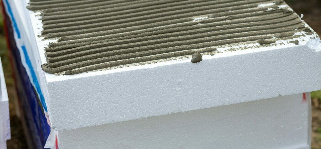 Insulate a dog crate with Styrofoam panels