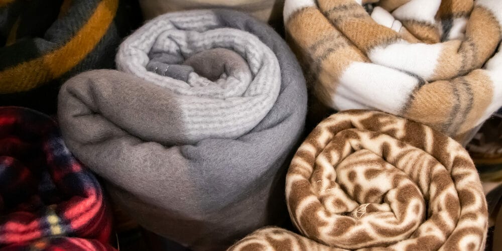 Why does dog hair stick so easy to fleece blankets? Why does dog hair stick so easy to fleece blankets?